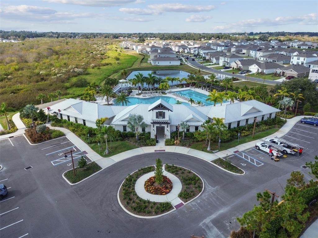 Aerial view of the community clubhouse and resort-style pool